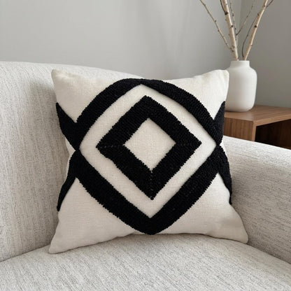 Geometrisch gemustertes Textil-Wurfkissen