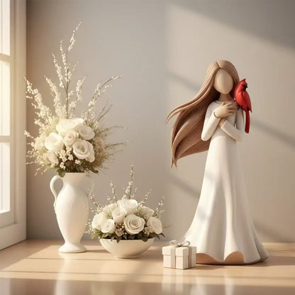 Figurine Holding Bird Homeandso
