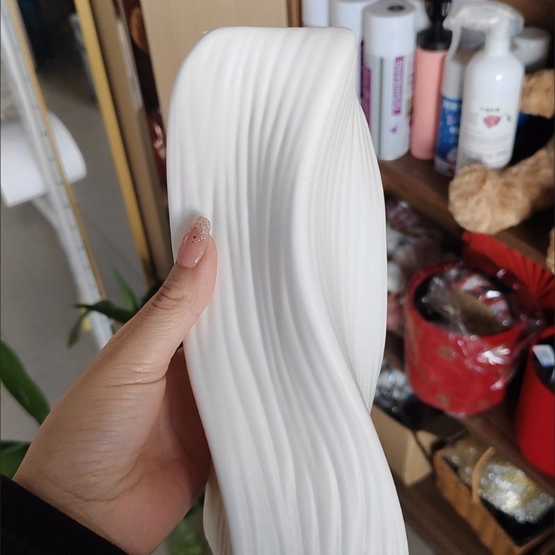 Artistic Wave-Patterned Decorative Sculpture