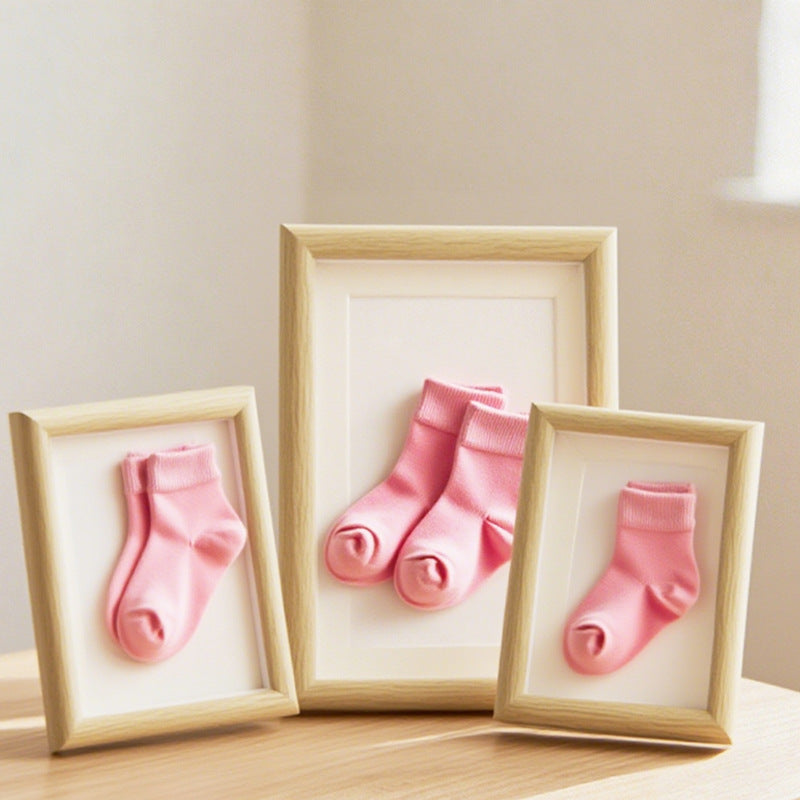 Framed Baby Sock Art